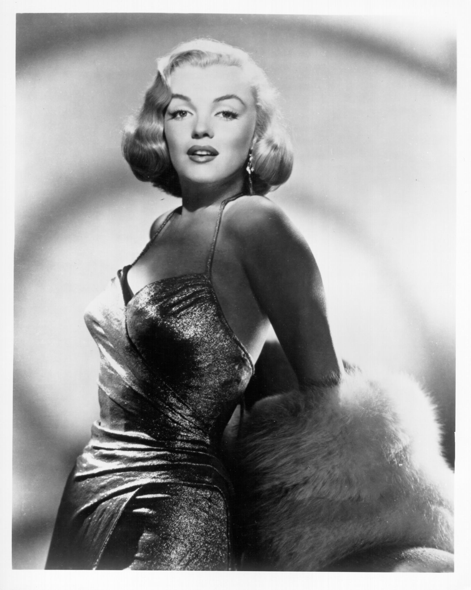 Image may contain Marilyn Monroe Photography Face Head Person Portrait Adult Fashion Clothing Dress and Blonde