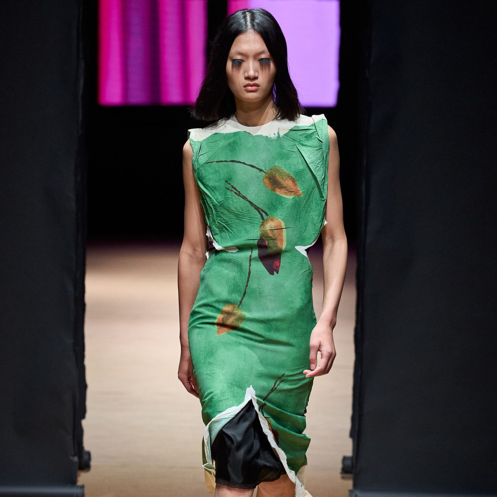 5 things to know about Prada’s SS23 show full of workwear skirt-suits and sheer outfits