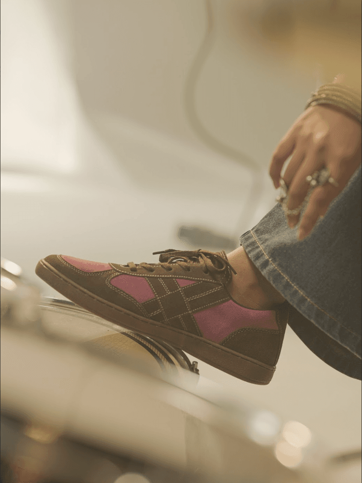 Image may contain Clothing Footwear Shoe Sneaker Body Part Finger Hand and Person