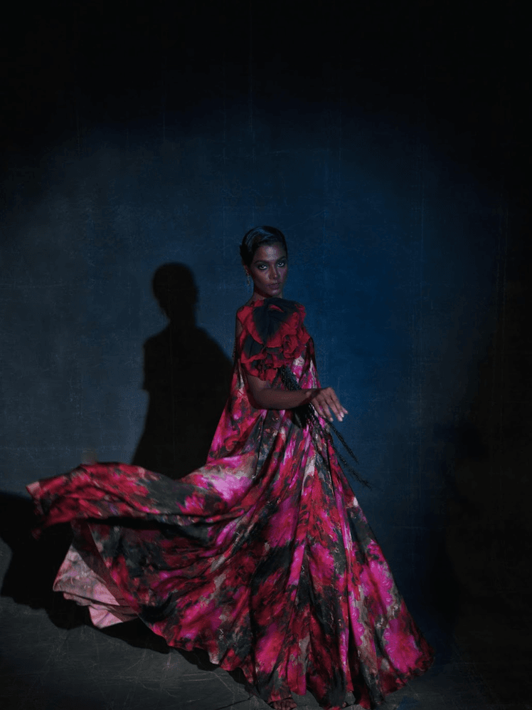 Image may contain Clothing Dress Dancing Leisure Activities Person Formal Wear Adult Dance Pose Fashion and Gown