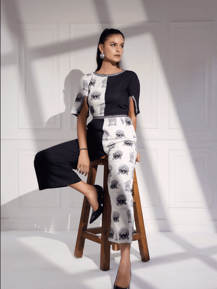 Image may contain Vassy Clothing Dress Adult Person Footwear Shoe High Heel Sleeve and Skirt